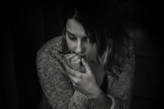 Greyscale Photography of Woman Wearing Long-sleeved Top