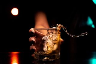 clear drinking glass with ice cubes