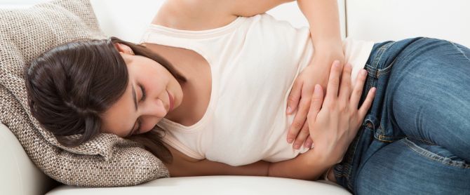 Woman Suffering From Stomachache