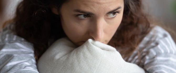 depressed woman thinking about problems