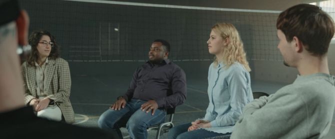 Diverse group of adults sharing experiences