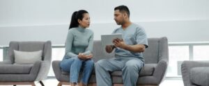 Healthcare provider consulting a patient