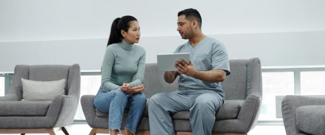 Healthcare provider consulting a patient