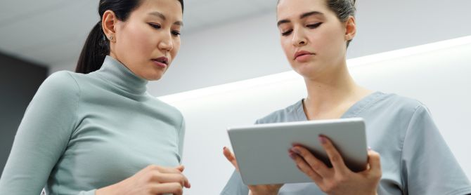 Two women engaged in a healthcare consultation
