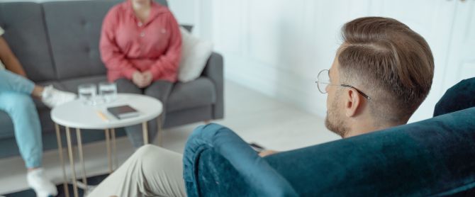 A man having a counseling session with a therapist