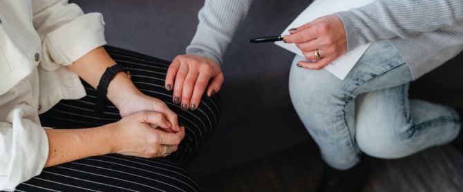 A supportive moment during a counseling session